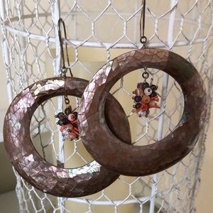 Large earrings pearls and shells.